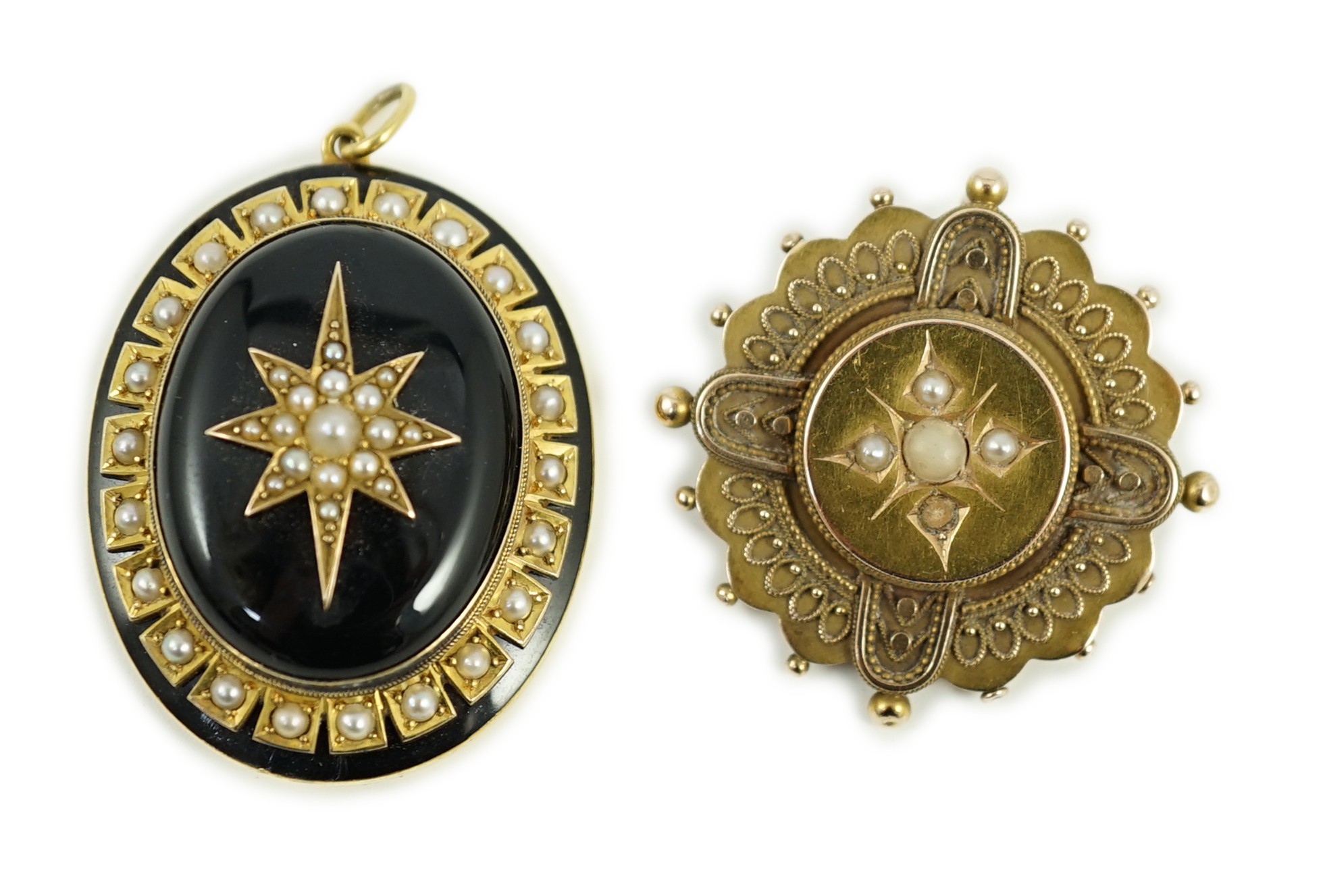 A Victorian yellow metal, black onyx, black enamel and split pearl set oval mourning pendant, 41mm and a Victorian 15ct, coral? and seed pearl set brooch, gross weight 21.5 grams.